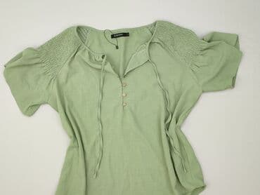 kombinezon oosc: Bluzka damska, rozmiar L — 1