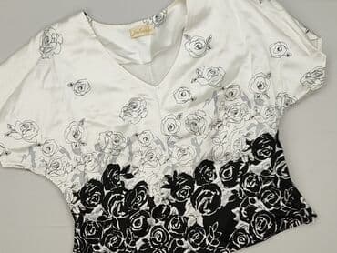 bluzki z krótkim rękawem eleganckie: Bluzka damska, rozmiar M — 1