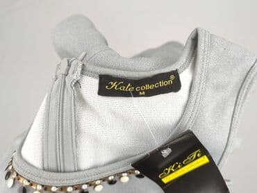 tanie sukienki do kolan: Sukienka damska, rozmiar M — 4