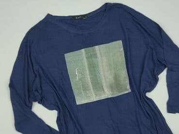 jeansy damskie podarte: Women's blouse, size L (EU 40) — 1