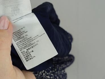 spódniczka mini rozkloszowane: Spódnica damska, rozmiar L — 5