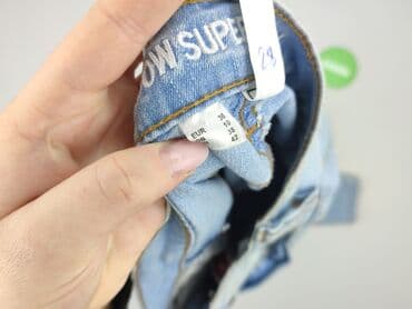 jeansy z asymetrycznym zapieciem: Jeansy damskie, rozmiar M — 4