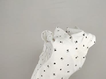 Ubrania damskie: T-shirt damski, rozmiar L — 6