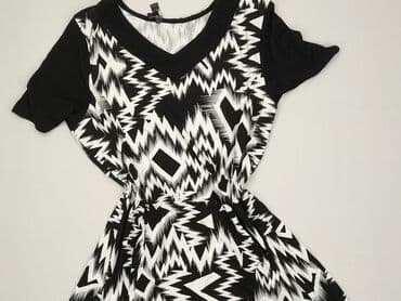 Women`s dress, size L (EU 40)