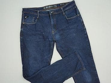 podwinięte jeansy: Jeansy dla mężczyzn, rozmiar XL — 1