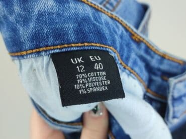 jeansy damskie przecierane: Jeansy damskie, rozmiar L — 4