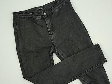 Ubrania damskie: Jeansy damskie, rozmiar XL — 1