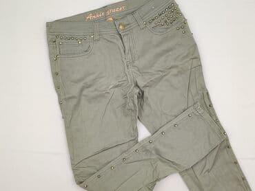 spodnie nabijane ćwiekami: Jeansy damskie, rozmiar M — 1