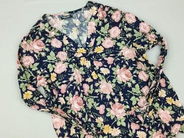 Ubrania damskie: Bluzka damska, rozmiar XL — 1