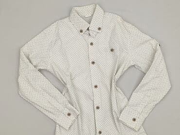 купити куртку в польщі жіночу: Women`s shirt, size XL (EU 42) — 1