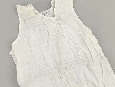 jeansy damskie podarte: Bluzka damska, rozmiar XL — 1