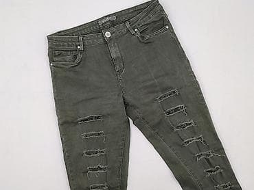 jeansu z dziurami: Jeansy damskie, rozmiar L — 1