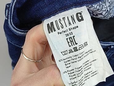 biale trampki mustang: Mustang, Jeansy damskie, rozmiar M — 5