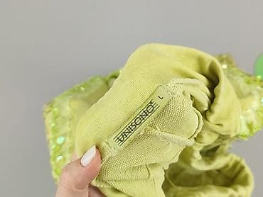 reebok caps: Spodnie dresowe damskie, rozmiar L — 4