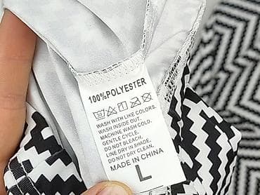 leginsy m: Spodnie materiałowe damskie, rozmiar L — 4