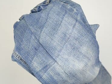 dziurawe dżinsy: Jeansy damskie, rozmiar L — 11