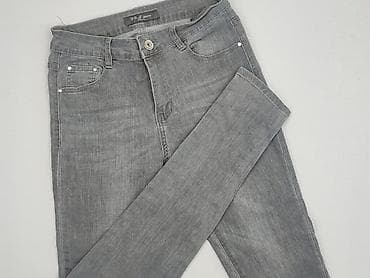 dzwony l: Jeansy damskie, rozmiar M — 1