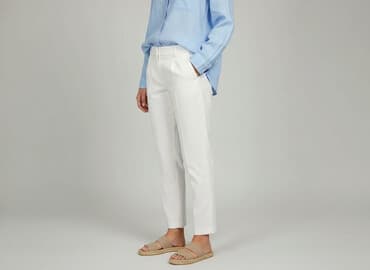 biale szerokie jeansy: Spodnie materiałowe damskie, rozmiar L — 6