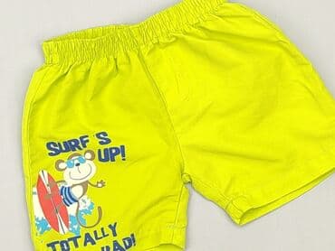 pomaranczowe spodnie dresowe: Shorts, 6-9 months, condition - Good — 1