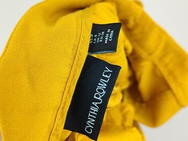 converse buty zimowe: Spodnie materiałowe damskie, rozmiar M — 4