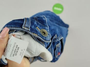 jeansy z asymetrycznym zapieciem: Jeansy damskie, rozmiar S — 4