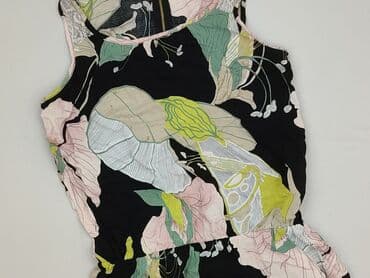 kombinezon zig zag: Kombinezon damski, rozmiar L — 1