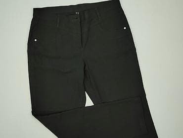 garnitur xl: Czarne damskie spodnie rurki - Krój: slim/skinny, długie nogawki - — 1