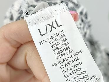 rysunki ubrań: Kombinezon damski L/XL – czarno-biały, geometryczny wzór - Fason — 4