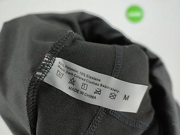 czarna: Legginsy Sportowe damskie, rozmiar M — 4