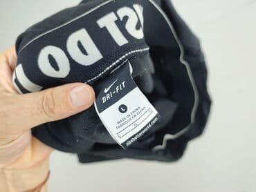 kapcie puchowe nike: Nike, Spodnie 3/4 damskie, rozmiar L — 4