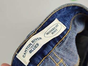 czerwone sandały na słupku ccc: Jeansy damskie, M — 4