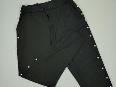 reebok backpacks: Спортивні штани жіночі, розмір L — 1