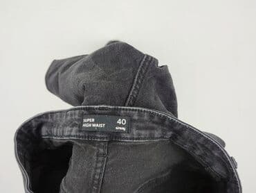 woskowane jeansy z wysokim stanem: Jeansy damskie, rozmiar M — 4