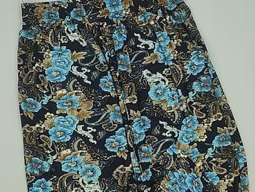 Damskie spodnie z kwiatowym wzorem - Fason: luźne, zwężane ku dołowi;