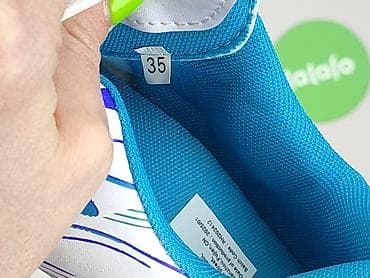 plecak do samolotu: Buty sportowe 35, Używany — 7