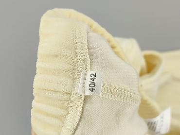 lata 70: Damskie spodnie welurowe, kremowe - Krój: proste nogawki, długość 7/8 — 4