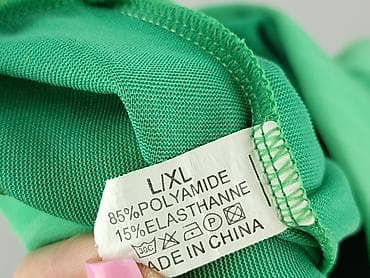 leginsy biale: Zielone damskie spodnie w delikatne, pionowe paski. - Krój: zwężane — 4