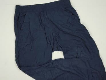jeansy damskie podarte: Women`s trousers, size M (EU 38) — 1