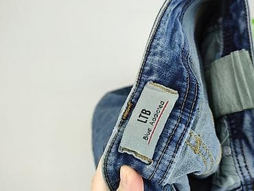 second hand store: Jeansy dla mężczyzn, rozmiar M — 4