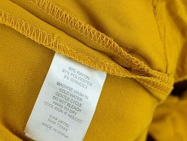 converse buty zimowe: Spodnie materiałowe damskie, rozmiar M — 5