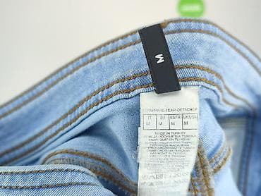 flared jeans: Jeansy damskie, rozmiar M — 4