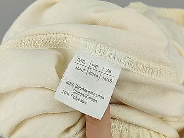 lata 70: Damskie spodnie welurowe, kremowe - Krój: proste nogawki, długość 7/8 — 5