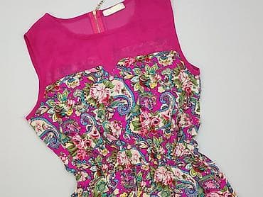 małecka moda: Kombinezon damski, rozmiar L — 1