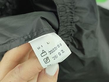 poliamid w kurtce: Spodnie materiałowe damskie, rozmiar L — 4