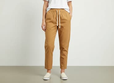 spodnie ze ściągaczem na dole: Material trousers for women, size S — 1