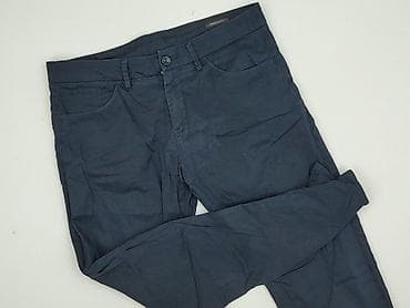 jeansy 34: Spodnie materiałowe damskie, rozmiar XL — 1