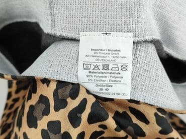 spódnice w panterkę z falbanami: Spódnica damska, rozmiar M — 6