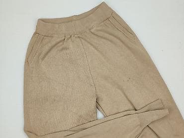 Damskie dzianinowe joggery w kolorze beżowym. - Fason: zwężane w lalafo.pl Damskie dzianinowe joggery w kolorze beżowym. - Fason: zwężane